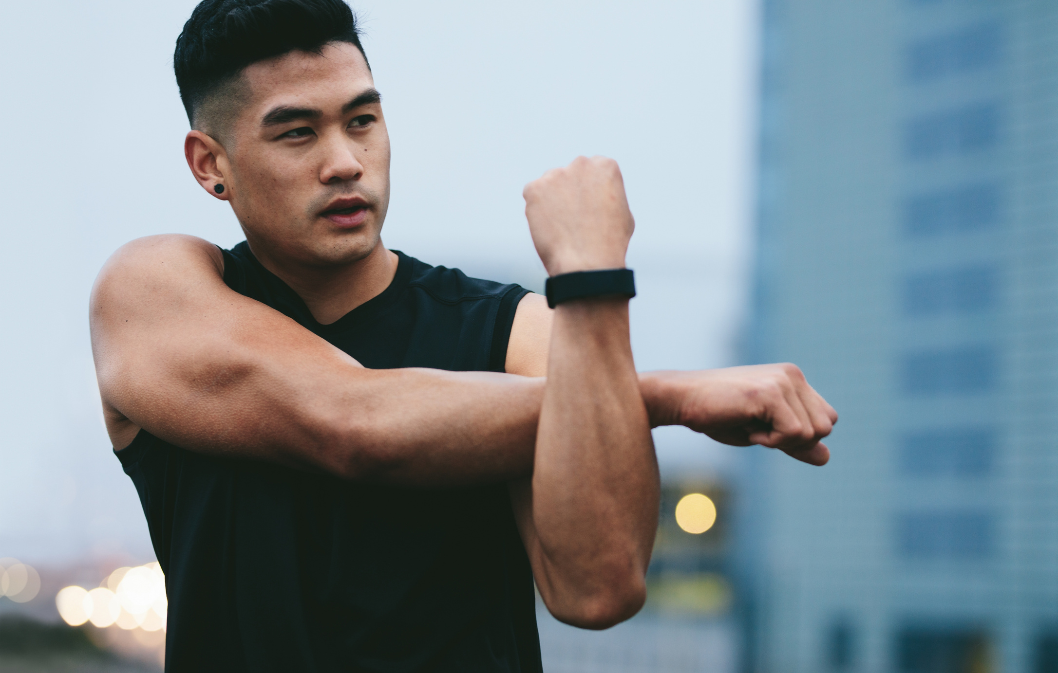 Asian Fitness Man Doing Warmup Workout